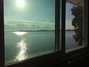 Гостиница Hilo Bay Oceanfront Bed and Breakfast  Хило